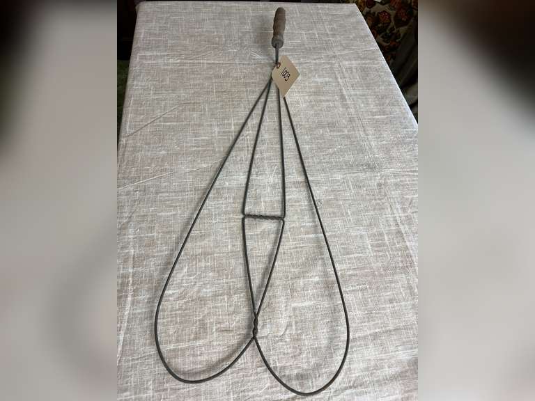 Vintage rug beater - 31” long.