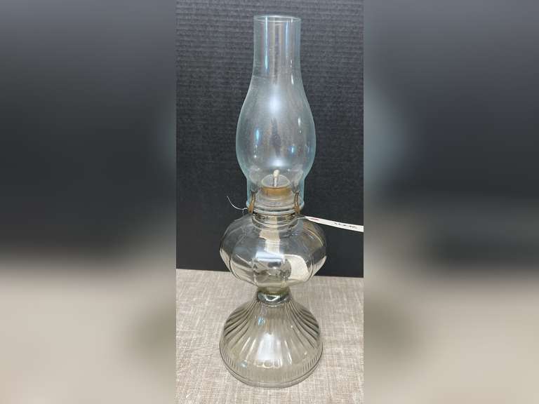 Clear glass oil lamp, 18” tall.