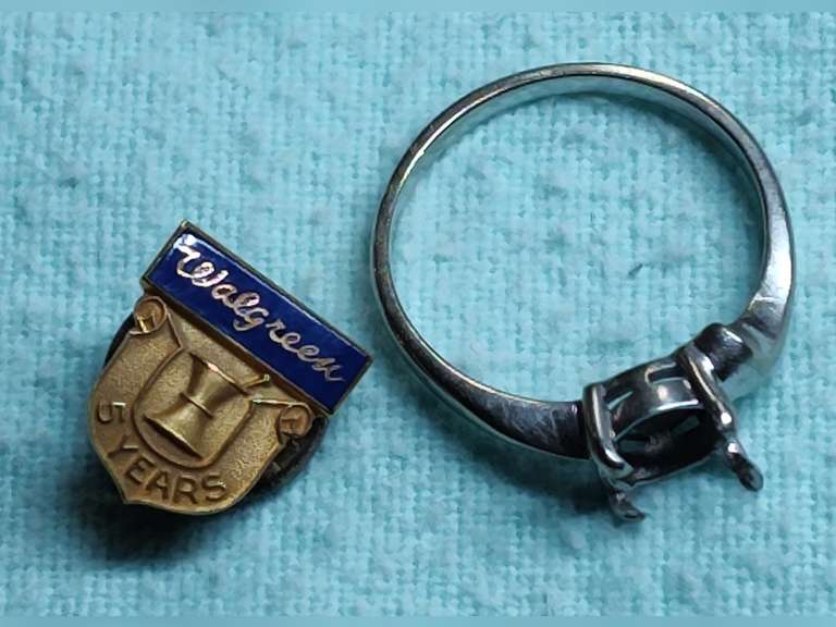Gold jewelry - The ring is marked 14k, the Walgreens 5-year pin is marked 10K