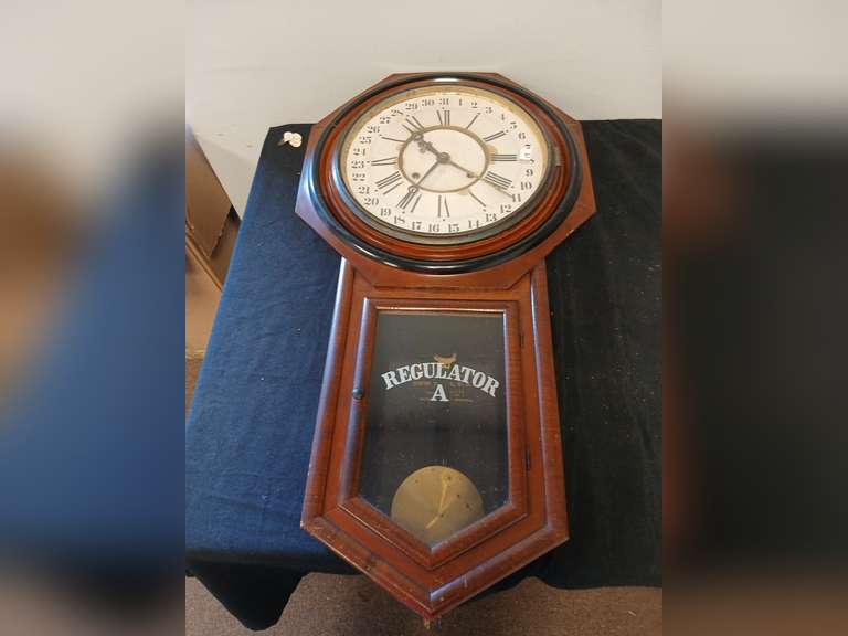 Antique Regulator A wall pendulum clock, with key