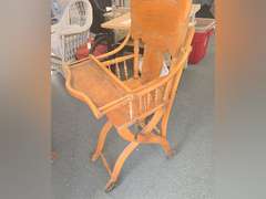 Crittenden room 2. 50+ Years of Collecting, Vintage John Deere Pedal Tractor with cart, All Original Condition, Wicker Rocking Chair, Gossip Bench, Antique HighChair/Stroller, Stoddard Implement Seat, Longaberger, Fenton, Artificial Flowers, Tools, Albums, 45s, Husqvarna Serger, Cast Iron, Crafting/Wine Bottles and More, Banks, Hull Pottery, Paper Mache Pictures, Dooney & Bourke, And Much, Much More