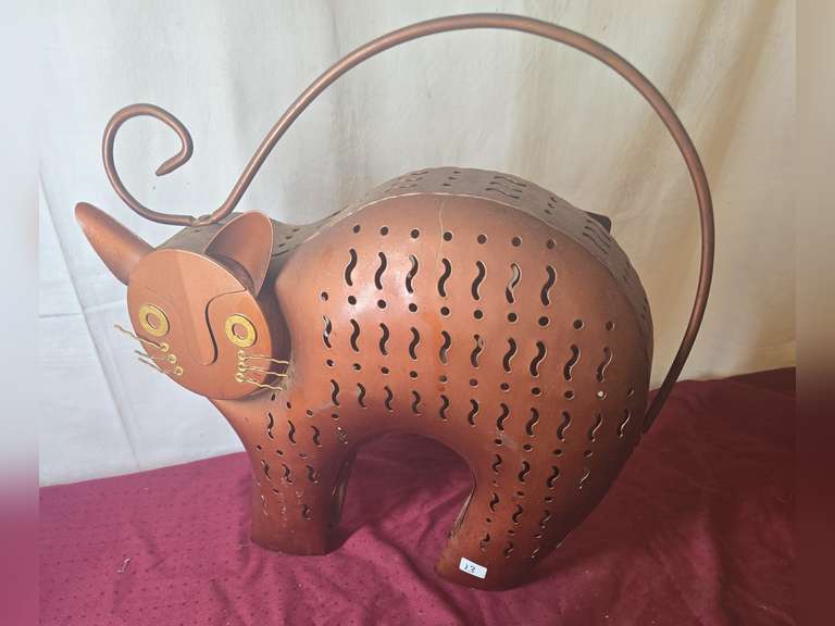 Possibly brass cat candle holder