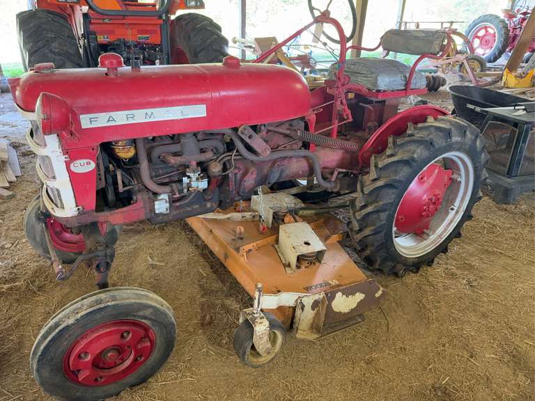 Farmall Cub with Woods 59 belly mower. Started and ran for 30 seconds, would not restart. Seller is having it looked at by mechanic.