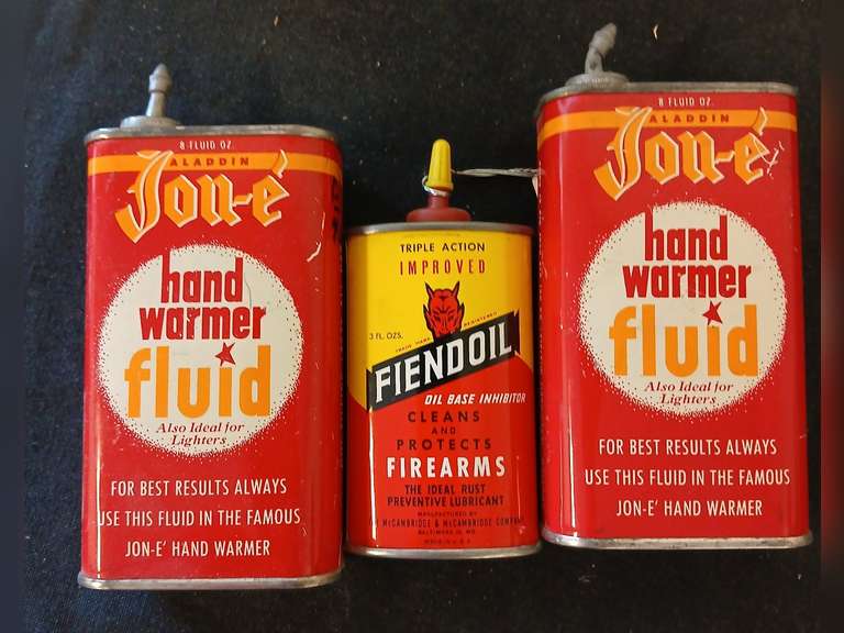 Tin of gun oil, 2 hand warmer fluid tins, empty