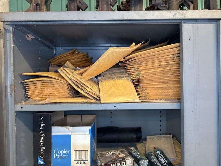 Large metal cabinet with contents