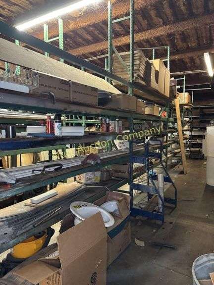 Warehouse shelving with contents (3 rows) 96' (not including metal pipe) buyer responsible for disassembly and removal