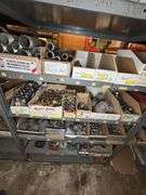 Contents of shelves Pipe fittings, reducers, couplings, etc.