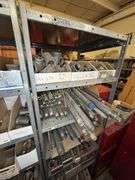 Contents of shelves Pipe fittings, reducers, couplings, etc.