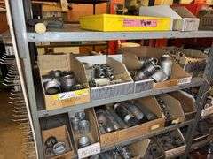 Contents of shelves Pipe fittings, reducers, couplings, etc.
