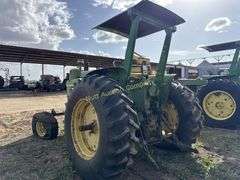 John Deere tractor. For parts or repair only. Condition unknown.