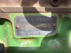 John Deere tractor. For parts or repair only. Condition unknown.