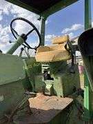 John Deere tractor. For parts or repair only. Condition unknown.