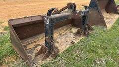 Quick attach skid steer bucket with quick hitch built in