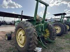 John Deere tractor. For parts of repair. Condition unknown.