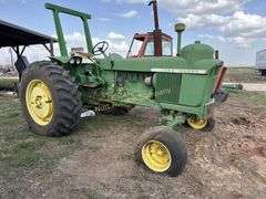 John Deere tractor. For parts of repair. Condition unknown.