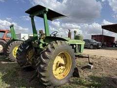 John Deere tractor. For parts or repair only. Condition unknown.
