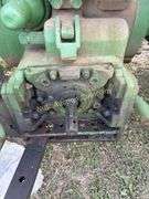 John Deere tractor. For parts of repair. Condition unknown.