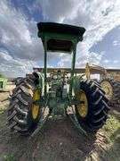 John Deere tractor. For parts of repair. Condition unknown.