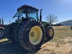 John Deere 8300 Tractor with duals Showing 1410 hours.  200 HP, 4WD, 403.6 hours showing, rear duals, front weights, 3 set of