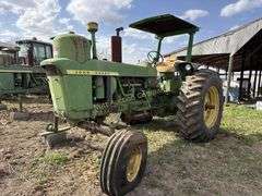 John Deere tractor. For parts or repair only. Condition unknown.