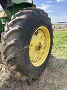 John Deere tractor. For parts of repair. Condition unknown.