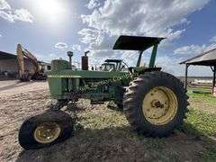 John Deere tractor. For parts or repair only. Condition unknown.