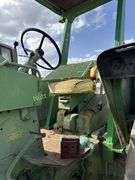 John Deere tractor. For parts of repair. Condition unknown.