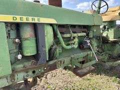 John Deere tractor. For parts or repair only. Condition unknown.