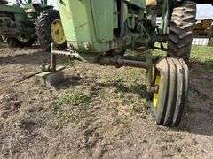 John Deere tractor. For parts or repair only. Condition unknown.