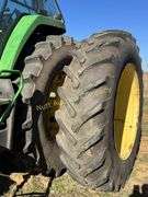 John Deere 8300 Tractor with duals Showing 1410 hours.  200 HP, 4WD, 403.6 hours showing, rear duals, front weights, 3 set of