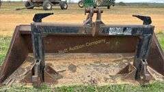 Quick attach skid steer bucket with quick hitch built in