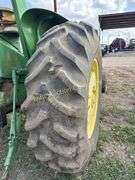 John Deere tractor. For parts of repair. Condition unknown.