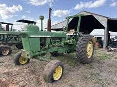 John Deere tractor. For parts of repair. Condition unknown.