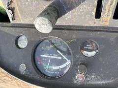John Deere tractor. For parts of repair. Condition unknown.