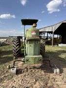 John Deere tractor. For parts of repair. Condition unknown.