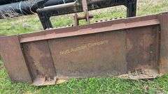Quick attach skid steer bucket with quick hitch built in