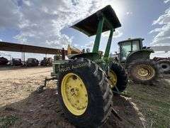 John Deere tractor. For parts of repair. Condition unknown.