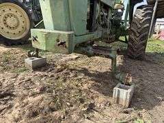 John Deere tractor. For parts of repair. Condition unknown.