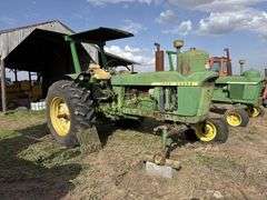 John Deere tractor. For parts or repair only. Condition unknown.