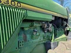 John Deere 8300 Tractor with duals Showing 1410 hours.  200 HP, 4WD, 403.6 hours showing, rear duals, front weights, 3 set of