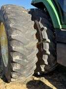 John Deere 8300 Tractor with duals Showing 1410 hours.  200 HP, 4WD, 403.6 hours showing, rear duals, front weights, 3 set of