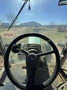 John Deere 8300 Tractor with duals Showing 1410 hours.  200 HP, 4WD, 403.6 hours showing, rear duals, front weights, 3 set of