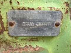 John Deere tractor. For parts or repair only. Condition unknown.
