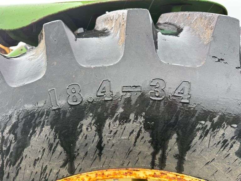 John Deere tractor. For parts or repair only. Condition unknown.