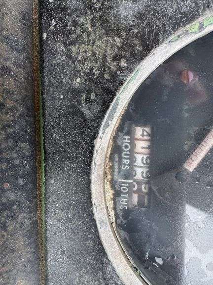 John Deere tractor. For parts of repair. Condition unknown.