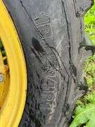 John Deere tractor. For parts of repair. Condition unknown.