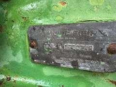 John Deere tractor. For parts of repair. Condition unknown.