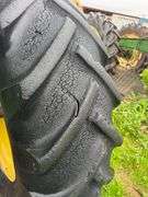 John Deere tractor. For parts of repair. Condition unknown.