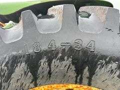 John Deere tractor. For parts or repair only. Condition unknown.