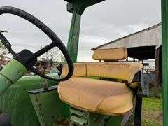 John Deere tractor. For parts or repair only. Condition unknown.
